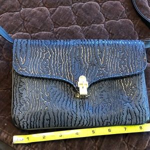 Robert Bestien carverd leather vintage clutch